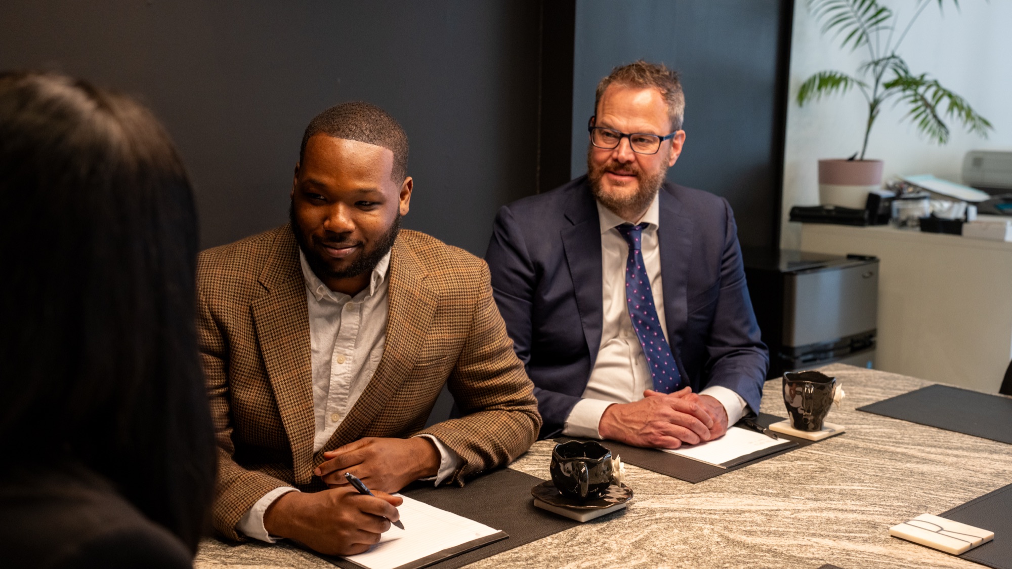 A meeting at the Rozich Law Group conference table